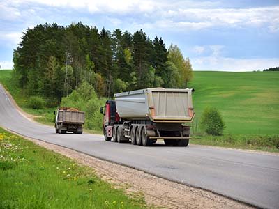 Trucks Hauling Material Image